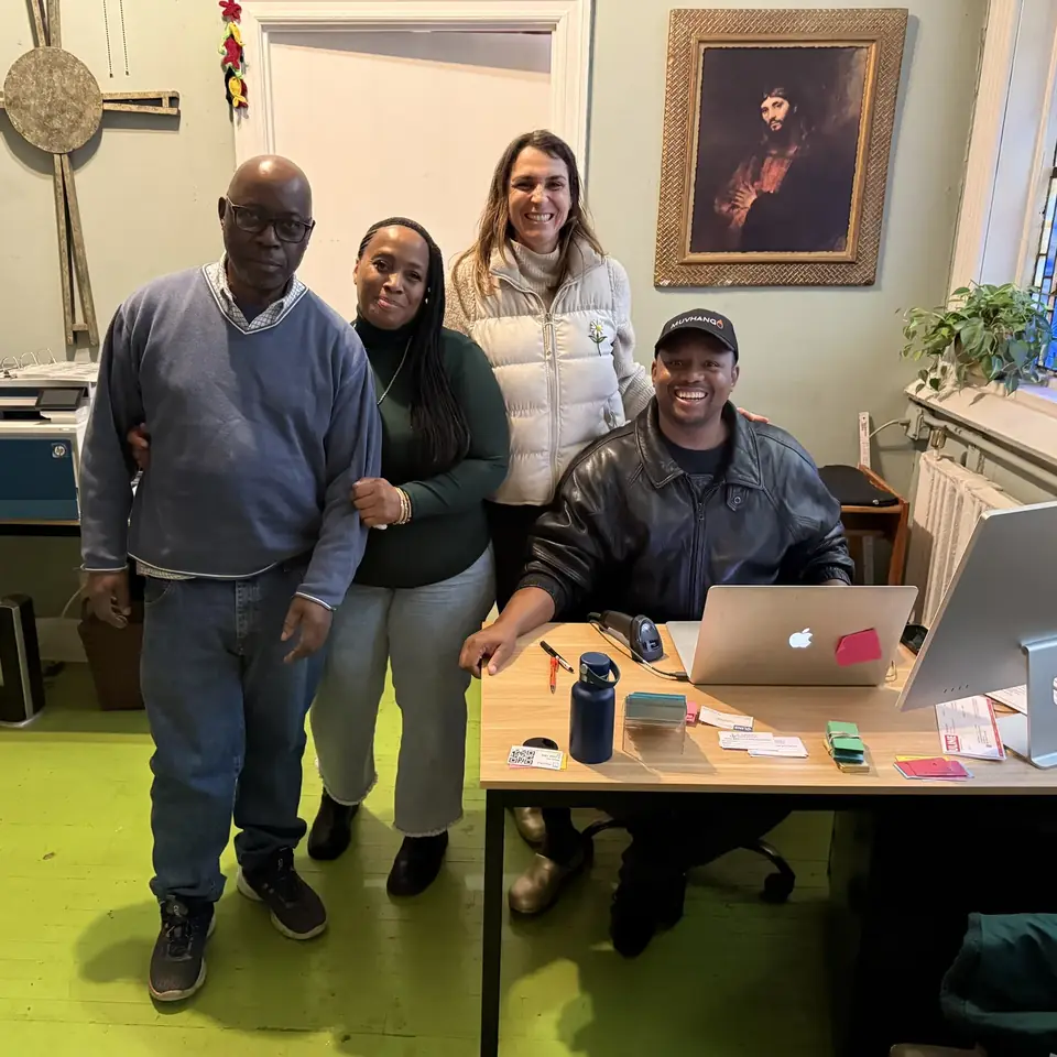 Members of the pantry team together in the church office