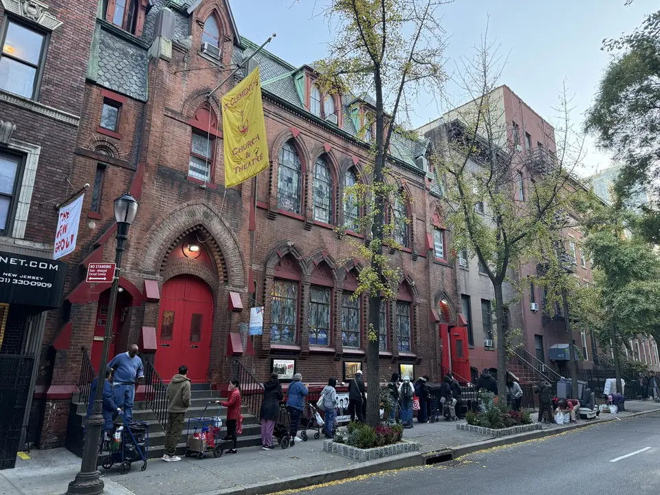 The line of neighbors along West 46th Street on a pantry morning, from the church steps down the block